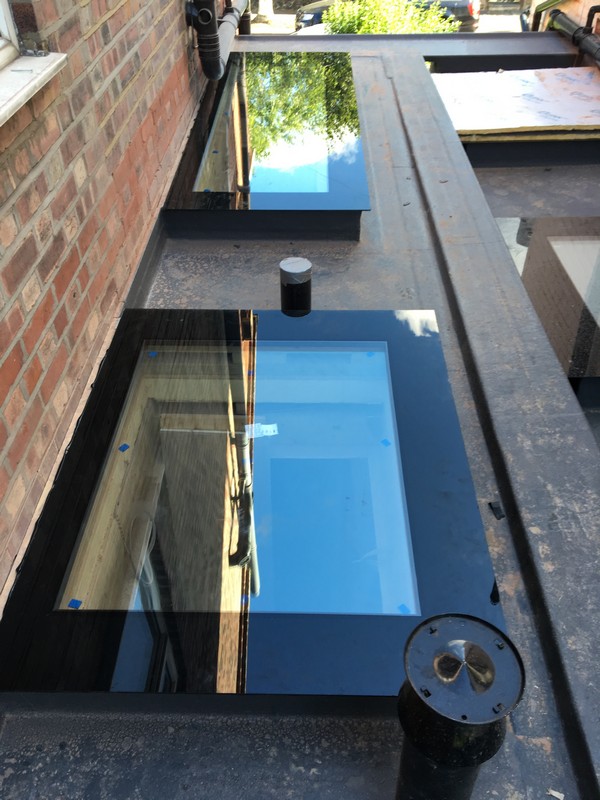 Multiple flat roof skylights on extension in Dalston